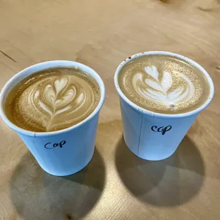 Two cappuccinos.
