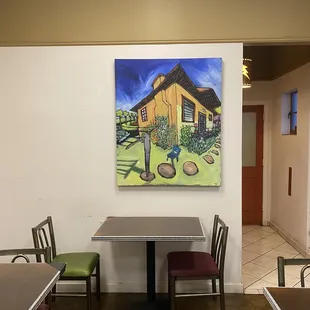 a table and chairs in a coffee shop