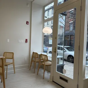 a table and chairs in a coffee shop