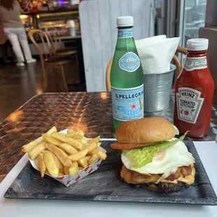 a burger and french fries on a plate