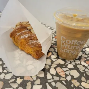 Almond croissant and salted pistachio latte