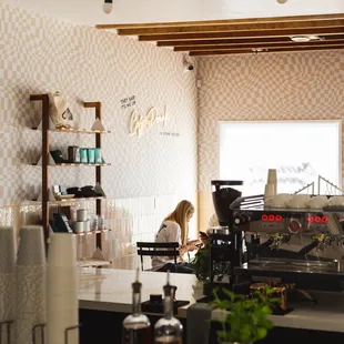 a woman working in a coffee shop