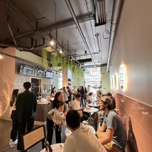 a group of people sitting at tables