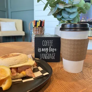 a plate of food and a cup of coffee