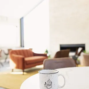 a coffee cup on a table