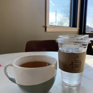 Hot green tea and water