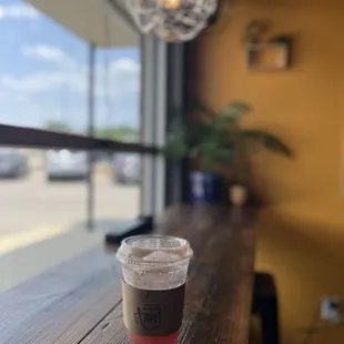 a cup of coffee on a table