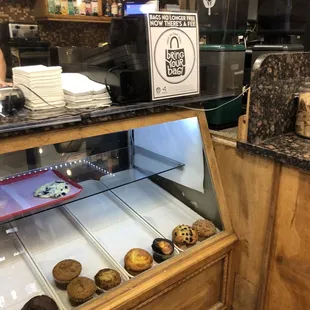 a display case with a variety of pastries