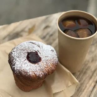 a pastry and a cup of coffee