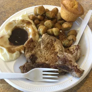 Grilled Pork Chops with Mashed potatoes and Gravy and Fried Okra