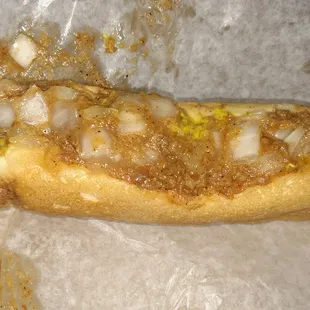 Mmmm chili dog with onions and extra mustard