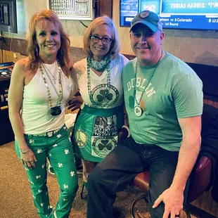 a man and two women posing for a picture