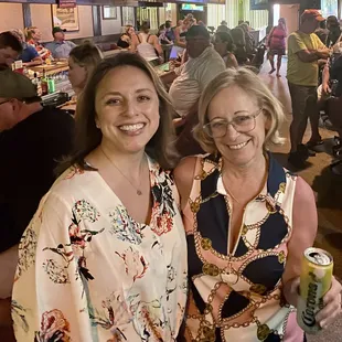 two women smiling for the camera