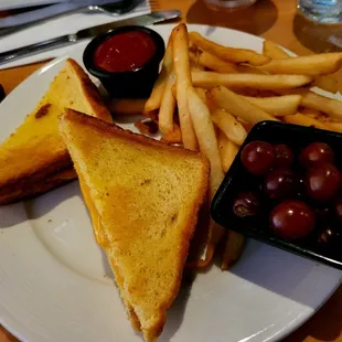 Grilled cheese sandwich and fries