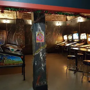 a row of pinball machines