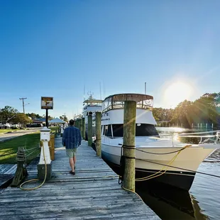 a man walking on a dock