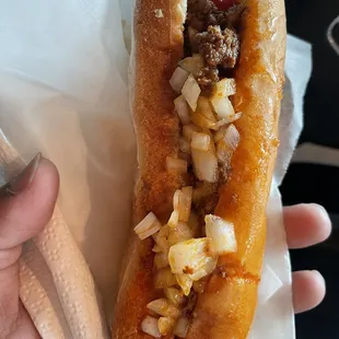 Chili Dog with cheese and onions.