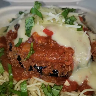 a plate of spaghetti with meat and sauce