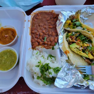 Pulled jackfruit tacos with mango and avocado