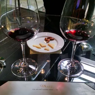 Cheese and almonds drizzled with truffle oil