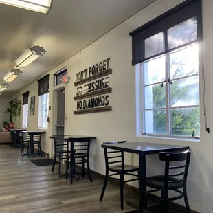 tables and chairs in a coffee shop