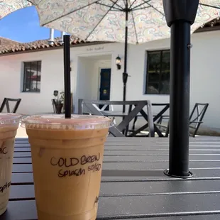 two cold drinks on a table