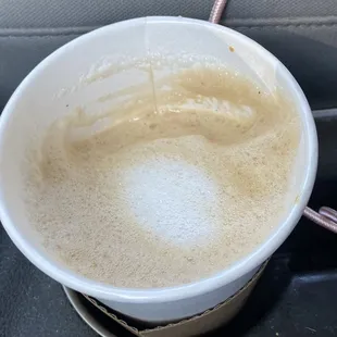 The cup felt light, took the lid off to find my large coffee only partially filled.