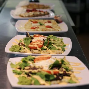 a row of salads