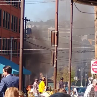 Outdoor seating with a view of a fire haha