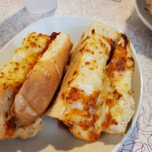 two hot dogs on a plate