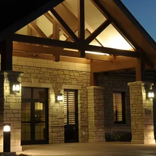 the front entrance of a home at night