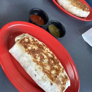 Toasted breakfast burrito with extra cheese, sausage and hash browns yum