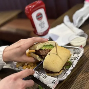 a person eating a sandwich