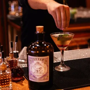 a bartender mixing a drink
