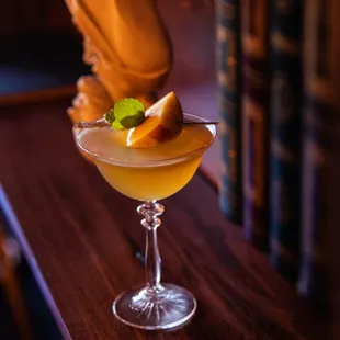 a glass filled with a drink