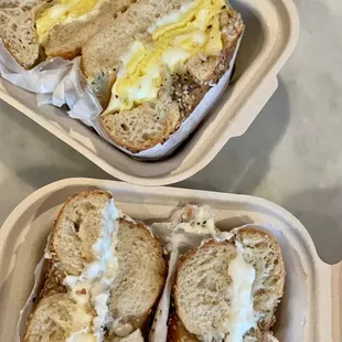 a close up of a sandwich in a styrofoam container