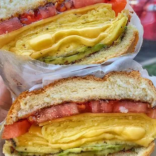 Eggs, cheese, avocado and added tomato slices