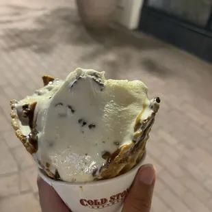 French vanilla with pecans on waffle cone drizzled with chocolate and caramel