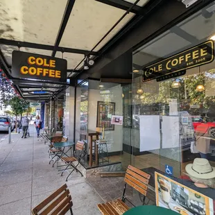Outside. Storefront at the corner of 3rd and College. Nice sidewalk patio.