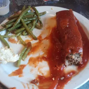 Lunch meatloaf and greenbeans, minus a bite I took.