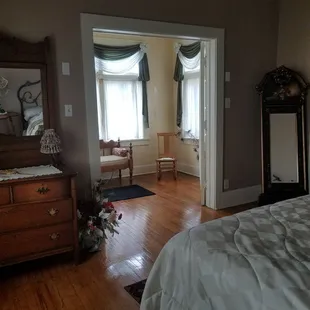 The view from the queen bedroom area into the sunroom.
