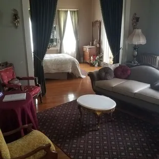 You enter the sweet in The Parlor, the queen bedroom area is ahead and the kitchenette is immediately to your left.