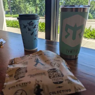 Medium mocha, blueberry+lemon pastry, and hot coffee in the YETI