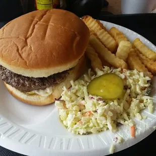 Jumbo hamburger plate with slaw and fries.