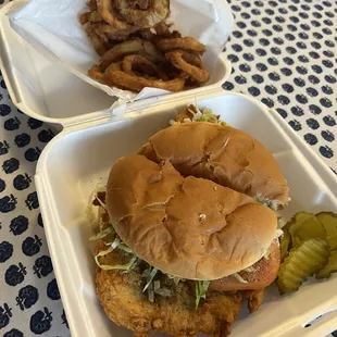Chicken on a bun with onion rings. Delicious.