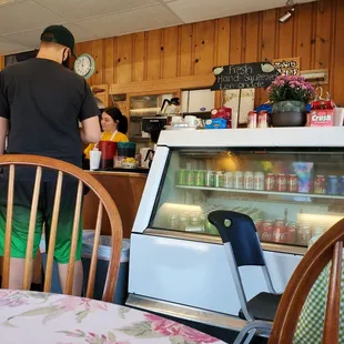 a man and a woman in the kitchen