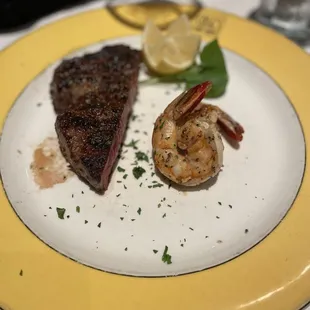 Black Angus Rib Eye Steak with grilled Grilled White Gulf Prawns