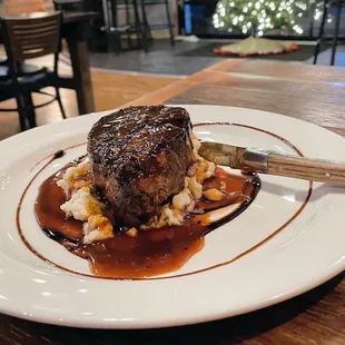8oz Filet Mignon with Demi Glaze on a bed of garlic mashed potatoes. EXQUISITE!!