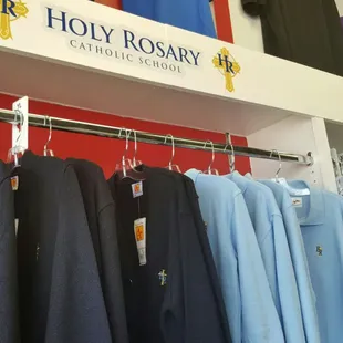 We supply school uniforms for Holy Rosary. Long and short sleeved polos, cardigans
