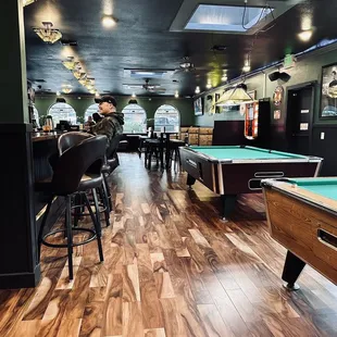 a pool table and bar